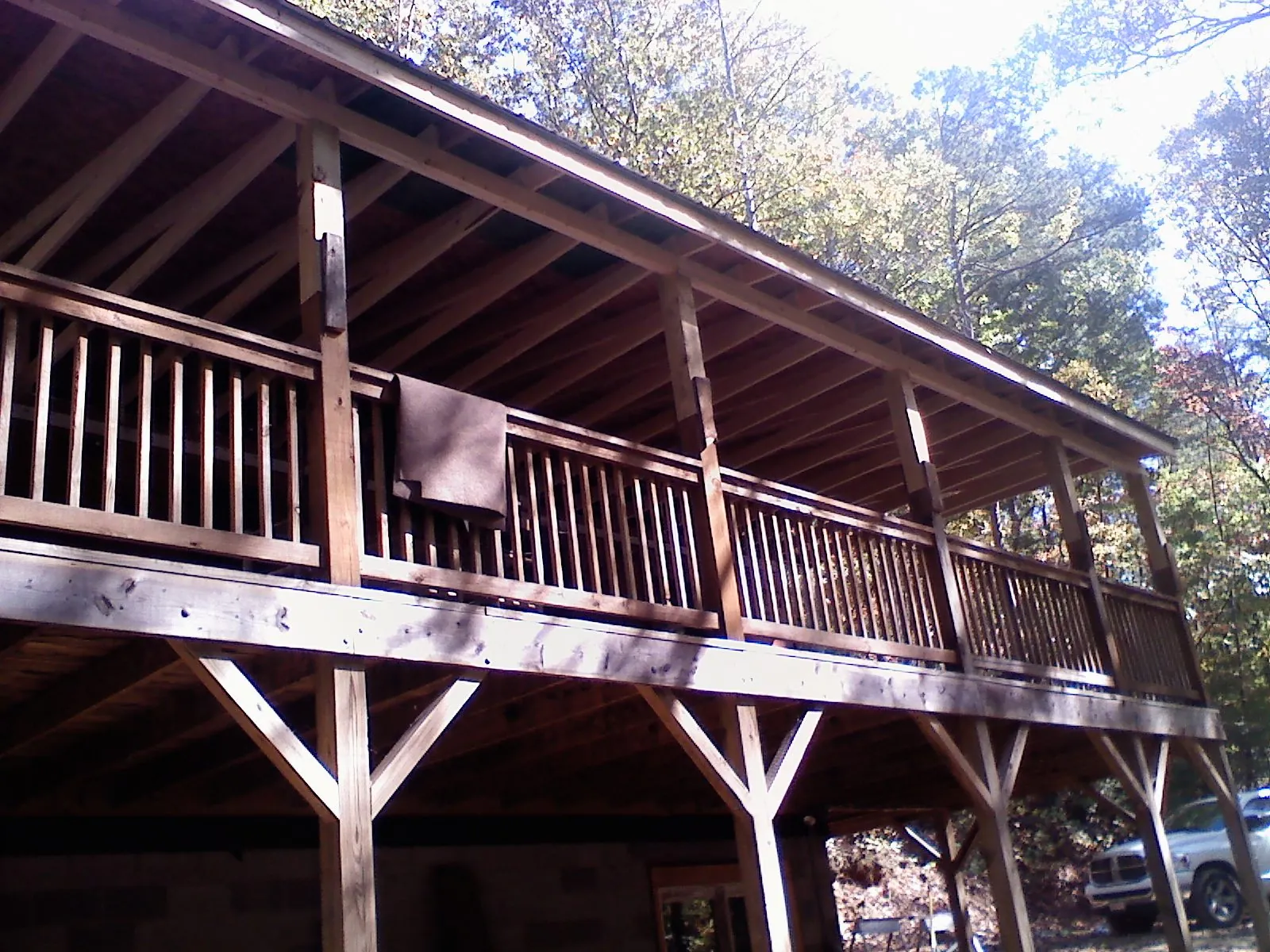 Timber framing under a new elevated porch and deck — Roof Leak Repair in Lees Summit by Roofing Brothers